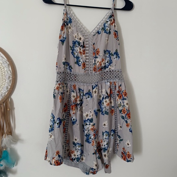 Angie Pants - BOGO Angie brand gray floral Romper.